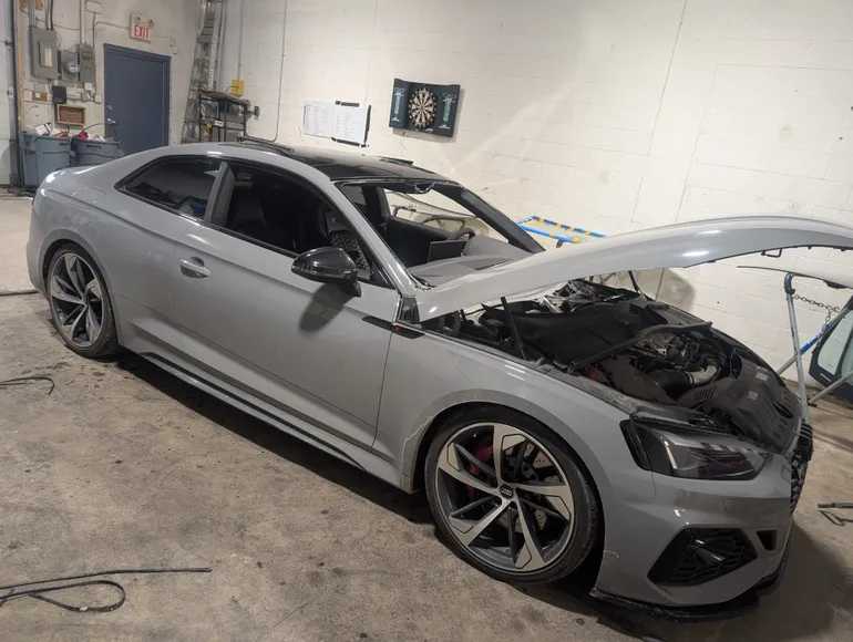 Multiple repair jobs - brake servicing, windshield replacement - at Stealth garage