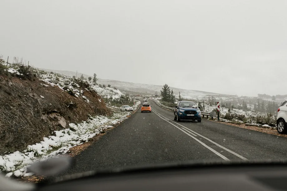 Snowy road on the hills in winter